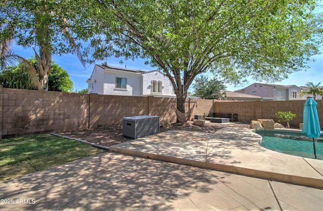 10402 E Javelina Ave, Mesa, AZ 85209 - fenced backyard with a patio area and central AC