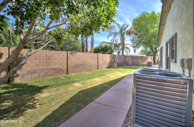 10402 E Javelina Ave, Mesa, AZ 85209 - view of yard with central AC and a patio area