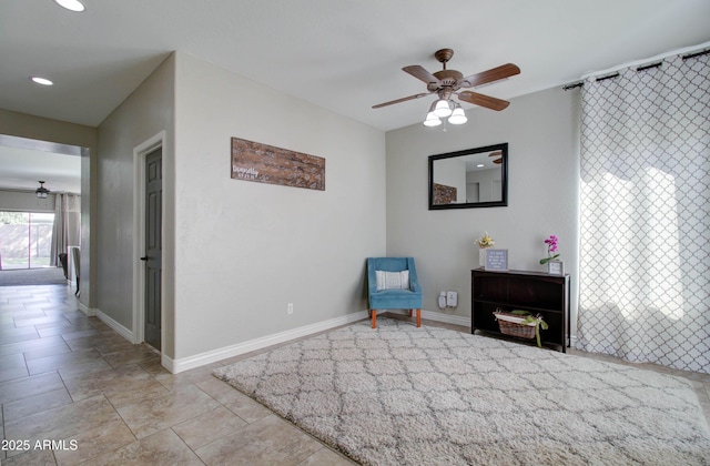 10402 E Javelina Ave, Mesa, AZ 85209 - sitting room with a ceiling fan, baseboards, and recessed lighting