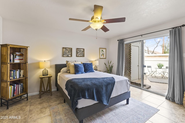 bedroom with light tile patterned floors, baseboards, access to exterior, and ceiling fan