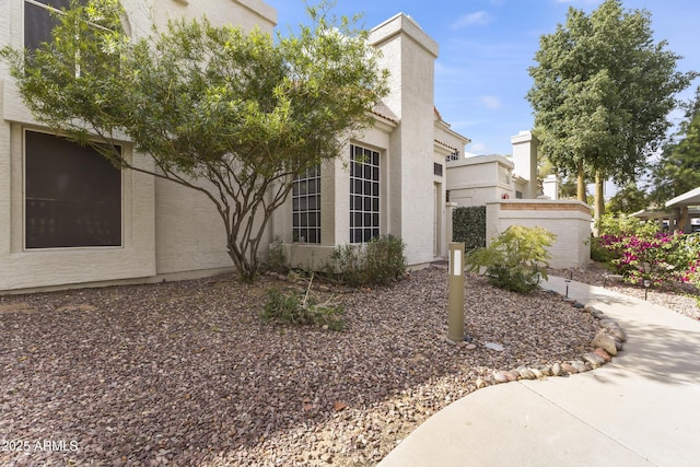 view of home's exterior with stucco siding