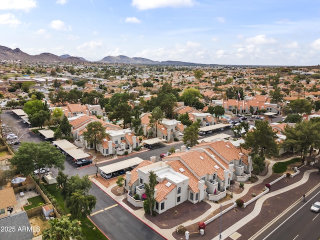 drone / aerial view with a residential view and a mountain view