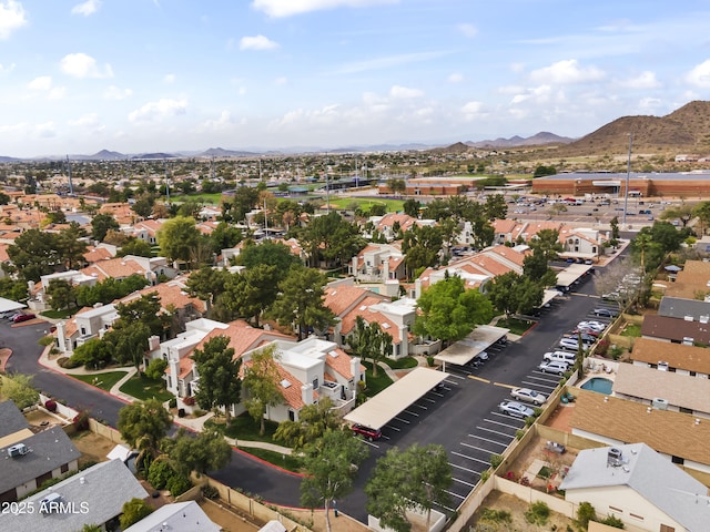 bird's eye view featuring a residential view and a mountain view