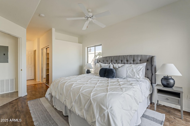 205 N 74th St Unit 261, Mesa, AZ 85207 - bedroom with wood finished floors, electric panel, and ceiling fan