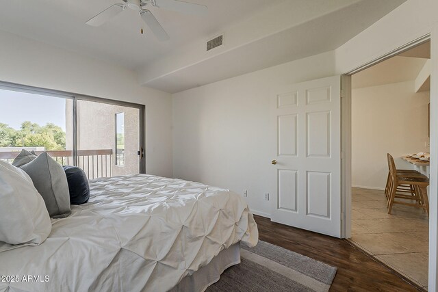 205 N 74th St Unit 261, Mesa, AZ 85207 - bedroom featuring access to outside, wood finished floors, and ceiling fan