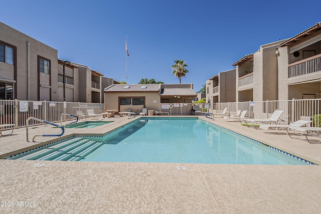 205 N 74th St Unit 261, Mesa, AZ 85207 - community pool featuring a patio area, a residential view, and a community hot tub