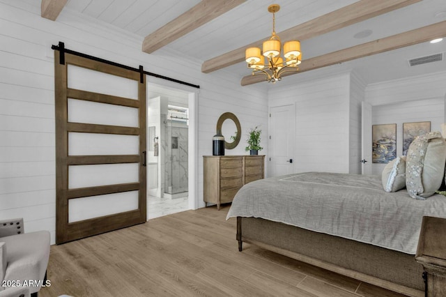 5756 E Star Valley St, Mesa, AZ 85215 - bedroom with visible vents, beam ceiling, wood finished floors, a barn door, and a chandelier