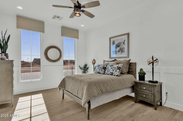5756 E Star Valley St, Mesa, AZ 85215 - bedroom featuring visible vents, ornamental molding, light wood finished floors, and access to exterior