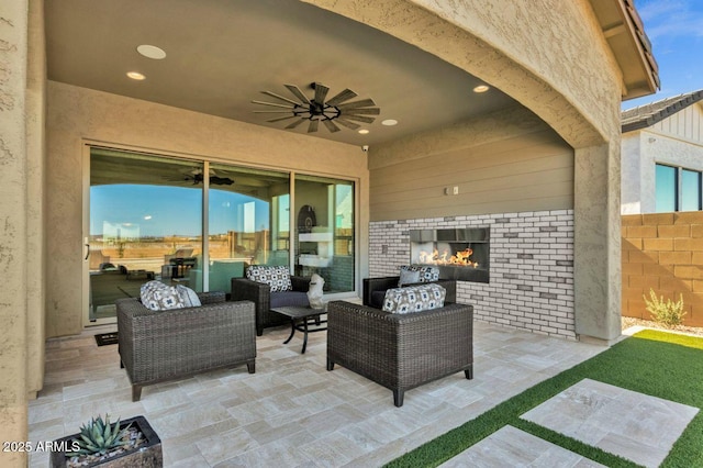 5756 E Star Valley St, Mesa, AZ 85215 - view of patio featuring a ceiling fan, an outdoor living space with a fireplace, and fence