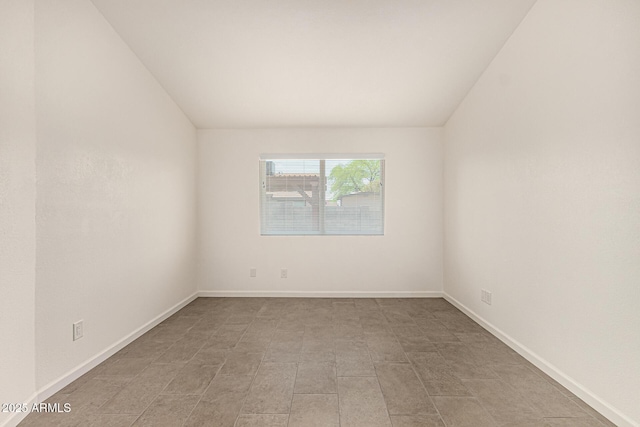 3039 W Ross Ave, Phoenix, AZ 85027 - unfurnished room with lofted ceiling and baseboards