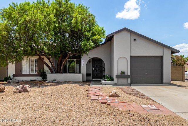 3039 W Ross Ave, Phoenix, AZ 85027 - view of front of home featuring driveway, an attached garage, and stucco siding