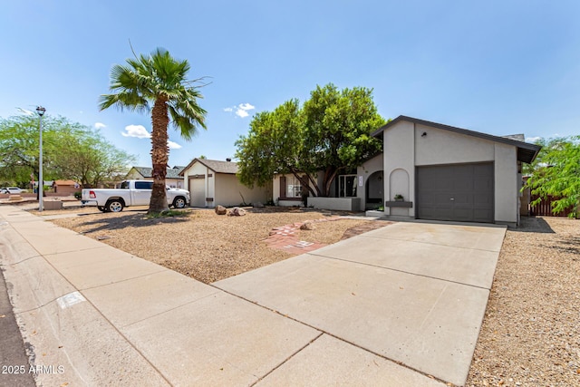 3039 W Ross Ave, Phoenix, AZ 85027 - view of front of house with a garage, driveway, and stucco siding