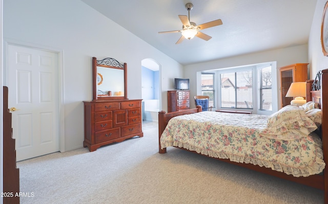 bedroom featuring vaulted ceiling, carpet floors, and ceiling fan