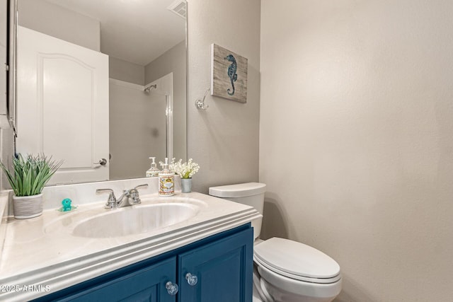 full bathroom with visible vents, a shower, a textured wall, toilet, and vanity