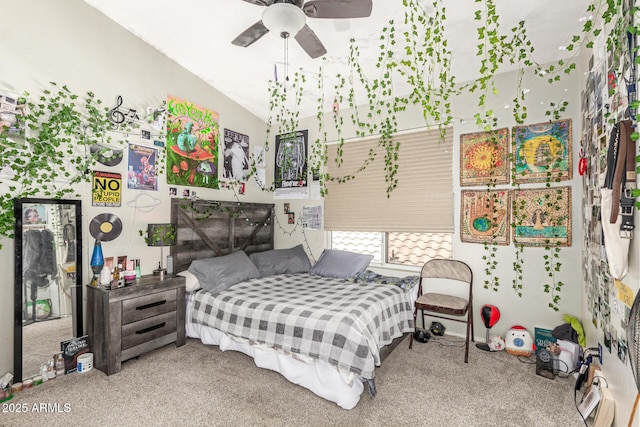 carpeted bedroom featuring lofted ceiling and ceiling fan