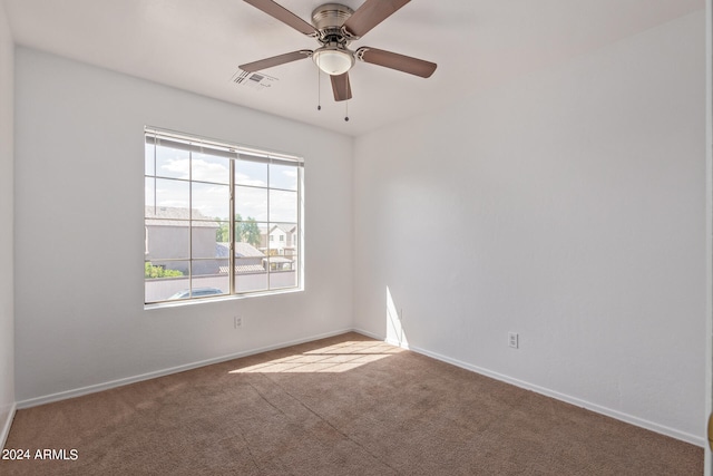 carpeted empty room with ceiling fan