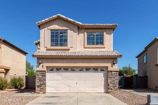 view of front of property featuring a garage