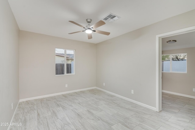 unfurnished room featuring ceiling fan