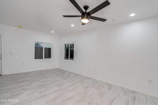 empty room featuring ceiling fan