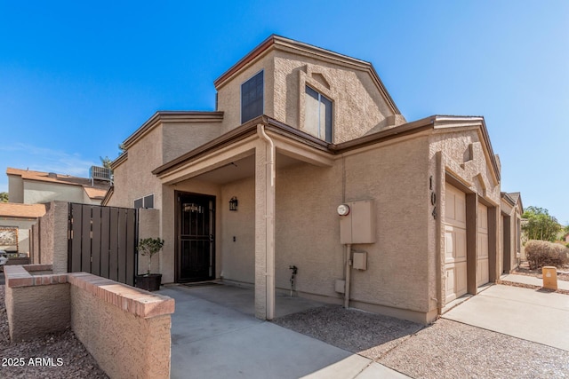 view of front of property featuring a garage