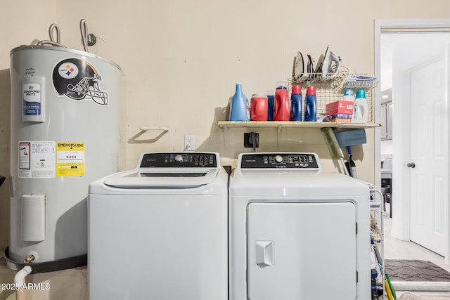 laundry room featuring separate washer and dryer and electric water heater