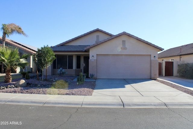 single story home with a garage