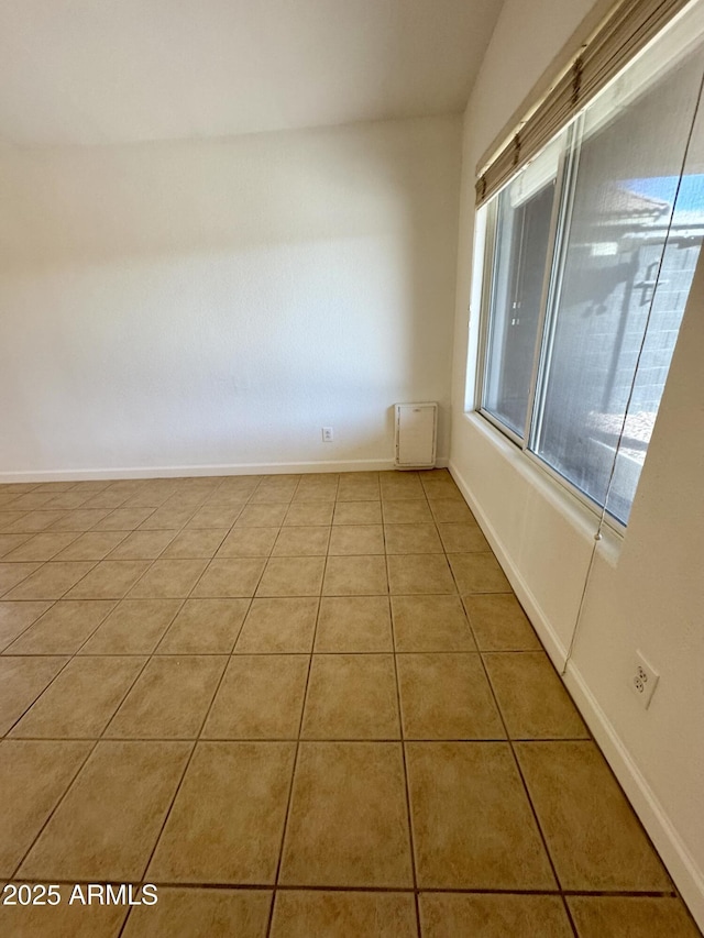 view of tiled spare room