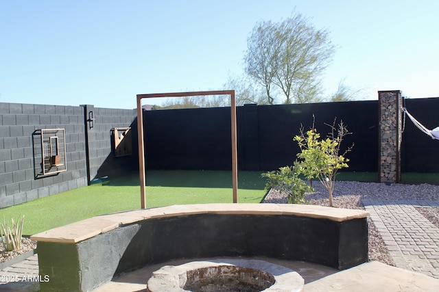 view of patio / terrace with a fire pit