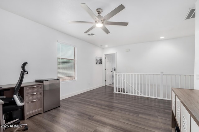 office featuring visible vents, dark wood-style floors, recessed lighting, baseboards, and ceiling fan