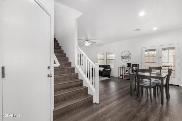 dining room featuring visible vents, stairs, french doors, ceiling fan, and dark wood-style flooring