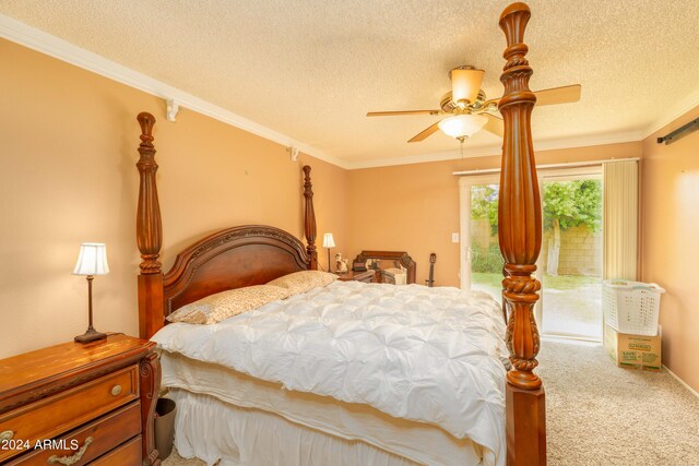 bedroom with a textured ceiling, carpet flooring, access to exterior, ceiling fan, and ornamental molding