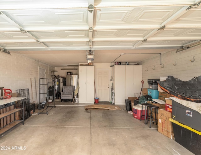 5119 W Onyx Ave, Glendale, AZ 85302 - garage with water heater and a garage door opener