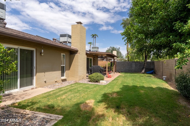 5119 W Onyx Ave, Glendale, AZ 85302 - view of yard with a fenced backyard and a patio area