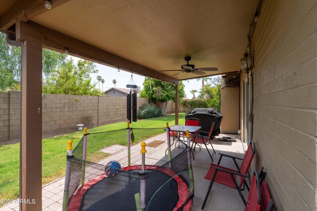 view of patio / terrace featuring ceiling fan and area for grilling