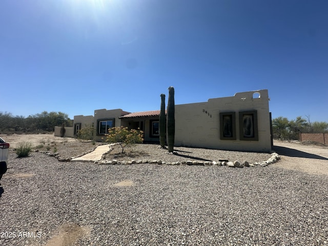 view of front of property featuring stucco siding