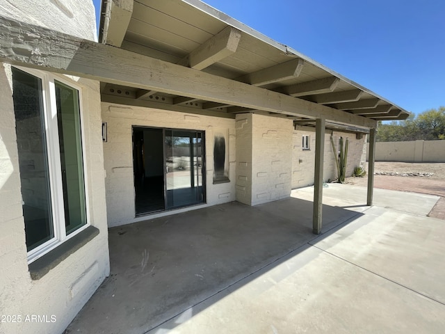 view of patio / terrace with fence