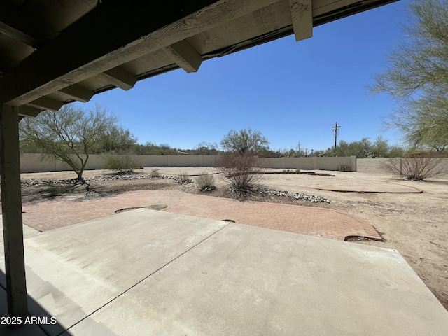view of patio featuring a fenced backyard