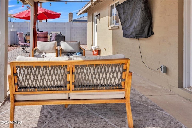 exterior space with fence and an outdoor hangout area