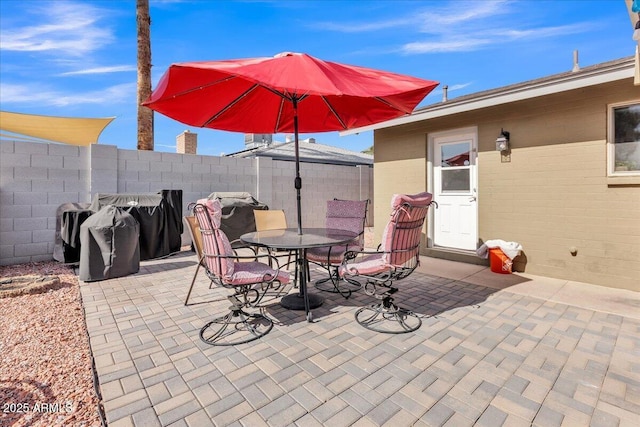 view of patio / terrace with fence and outdoor dining space