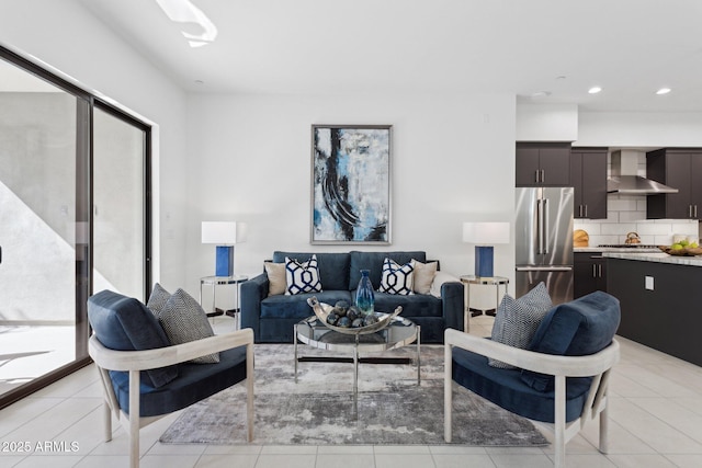 living room featuring recessed lighting and light tile patterned floors