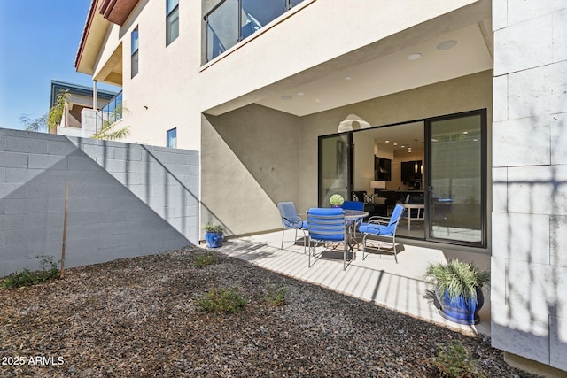 view of patio with fence