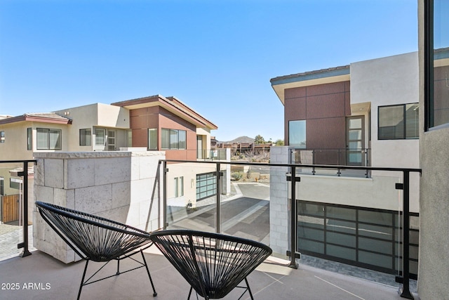 balcony featuring a residential view