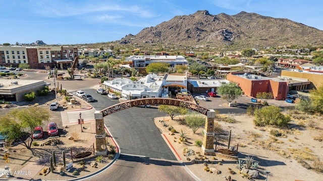 birds eye view of property featuring a mountain view