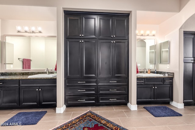 bathroom featuring vanity and tile patterned flooring