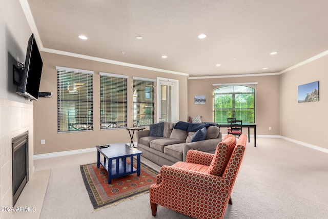 living room with crown molding and light colored carpet