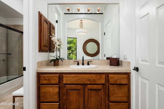 7025 E Ashler Hills Dr, Scottsdale, AZ 85266 - bathroom with vanity and combined bath / shower with glass door