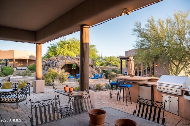 7025 E Ashler Hills Dr, Scottsdale, AZ 85266 - view of patio / terrace with a bar