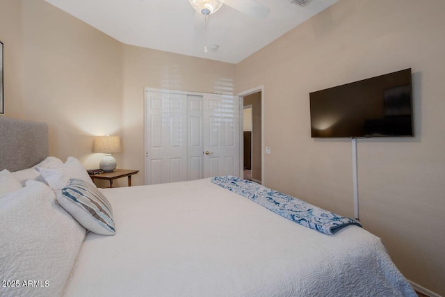 bedroom featuring visible vents, a closet, and a ceiling fan