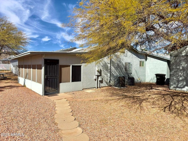 view of home's exterior with stucco siding