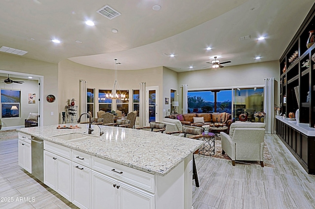 17249 E Fort Verde Rd, Rio Verde, AZ 85263 - kitchen featuring a sink, ceiling fan, open floor plan, white cabinets, and recessed lighting